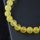 Matt yellow round amber bracelet